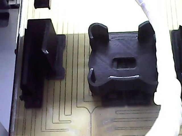 Printer camera view of a finished plate on the bed